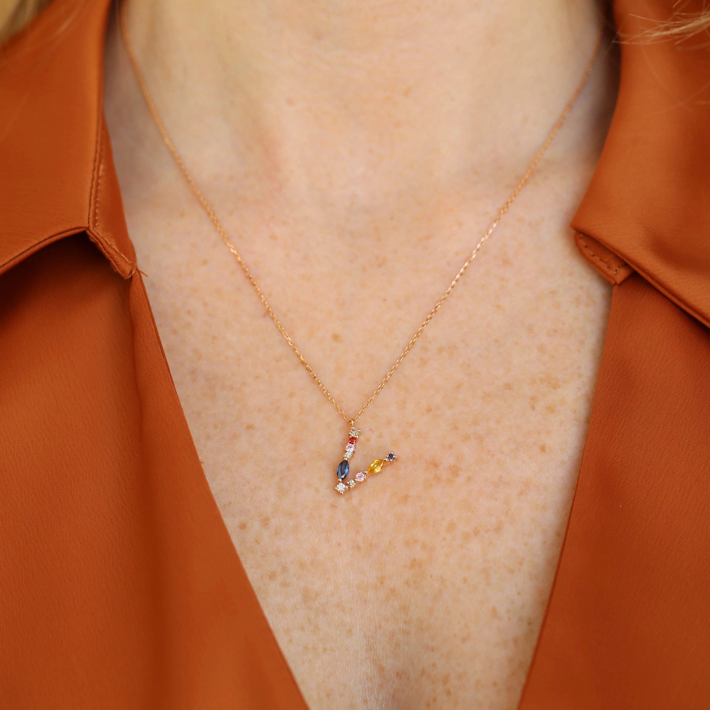 0-69-ct-brown-pirlanta-ve-multicolor-safir-tasli-v-harf-kolye-174050.jpg