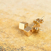 Gravity Pin Cube Gold Earrings